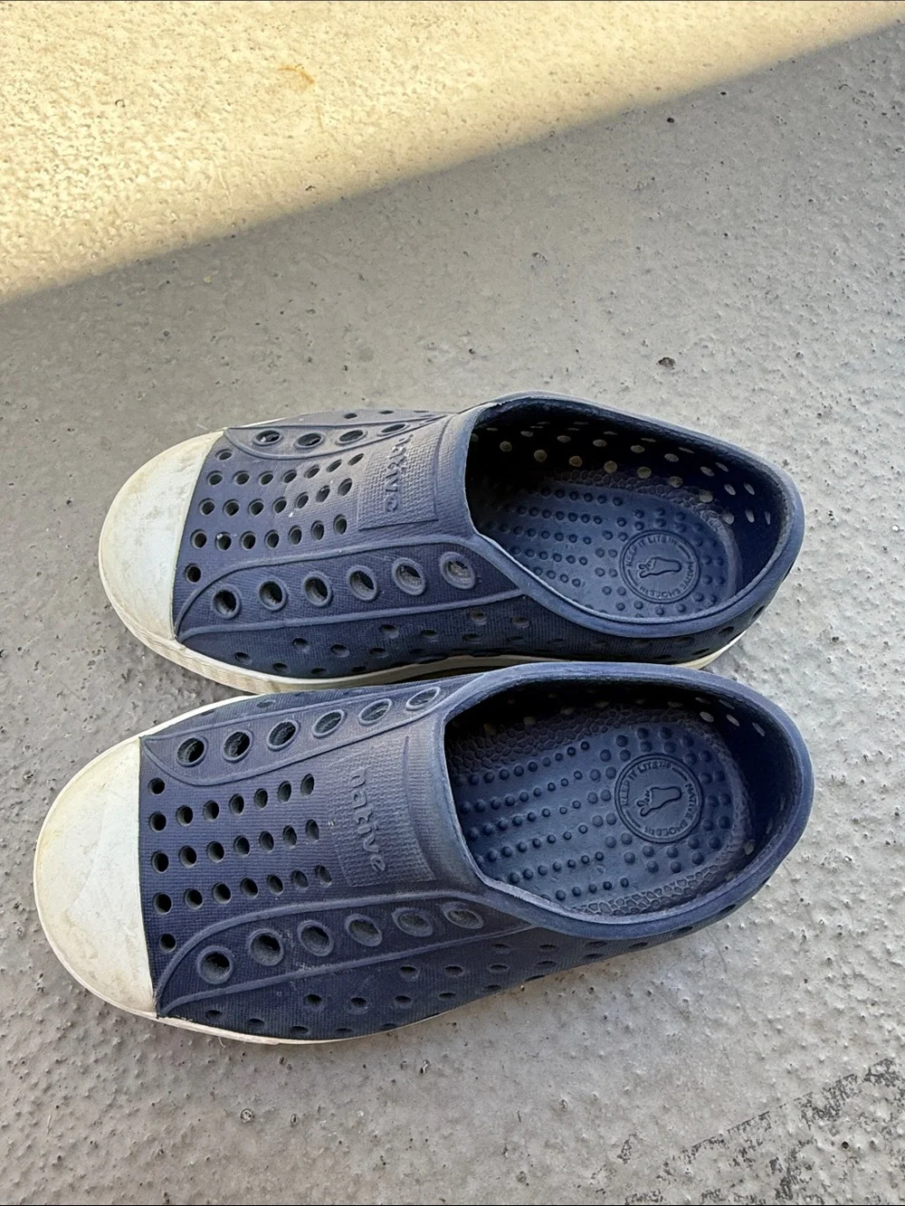 Native Navy Slip-On Sneakers with White Toe Cap